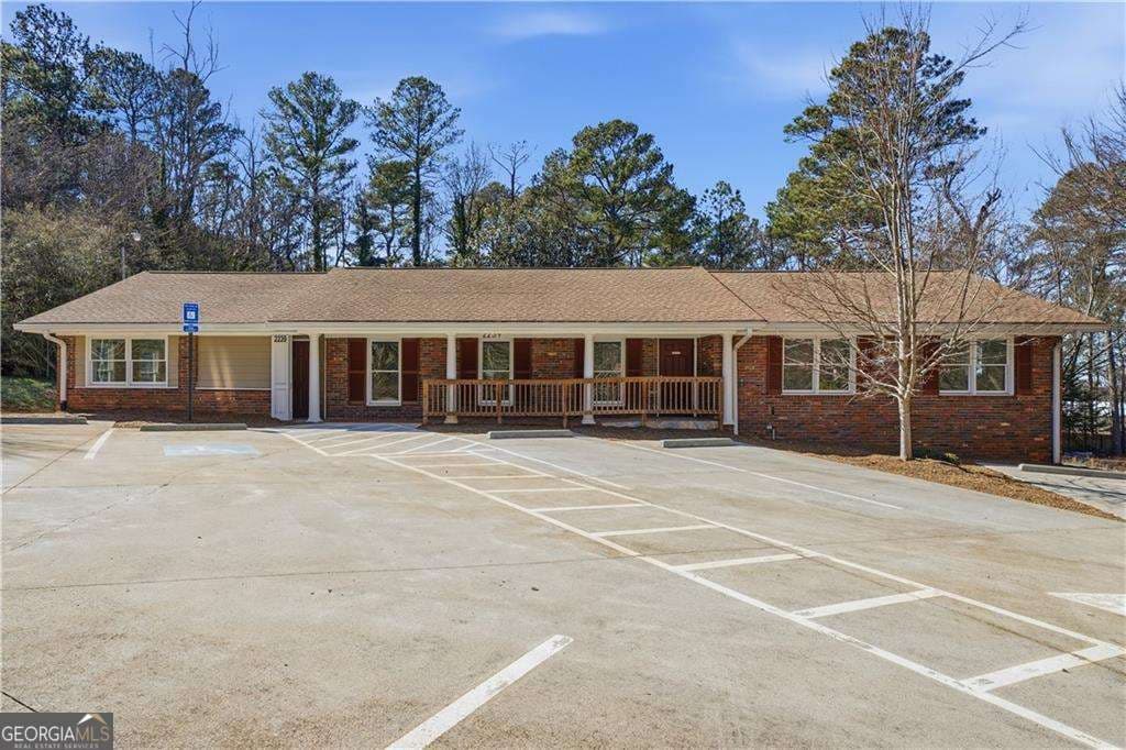 4 bedroom, 2 bathroom, 2,200 sq ft single family residence for sale at 2239 Scenic Drive, Snellville, GA 30078 — photo 1 of 42