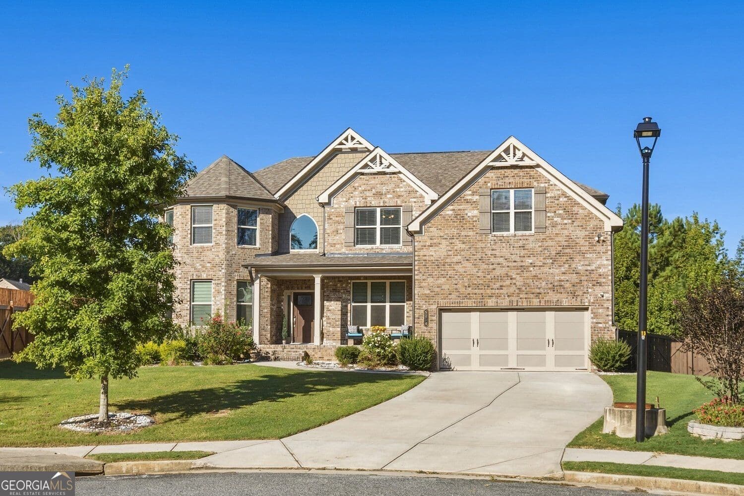 7 bedroom, 5 bathroom, 5,932 sq ft single family residence for sale at 5296 Cheval Court, Suwanee, GA 30024