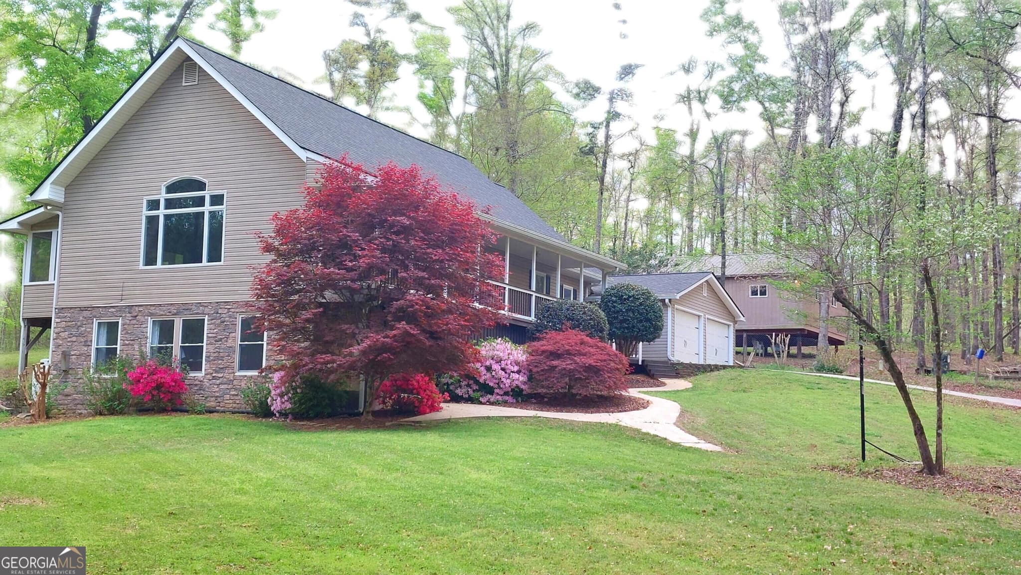 4 bedroom, 3 bathroom, 3,476 sq ft single family residence for sale at 335 Winding Stream Trail, Hampton, GA 30228 — photo 2