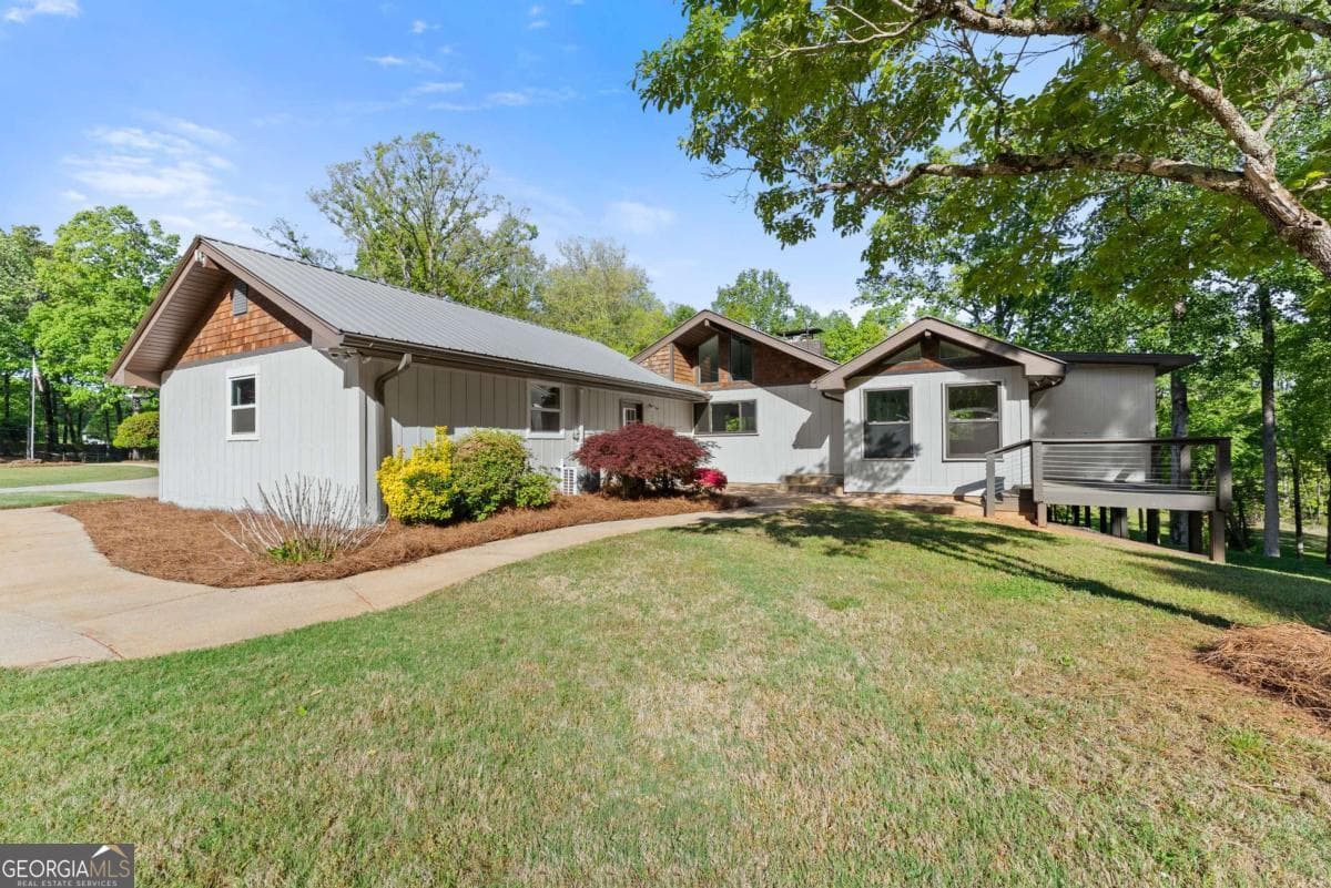 4 bedroom, 3 bathroom, 1,464 sq ft single family residence for sale at 6632 Mountain Meadow Drive, Clermont, GA 30527 — photo 1 of 77
