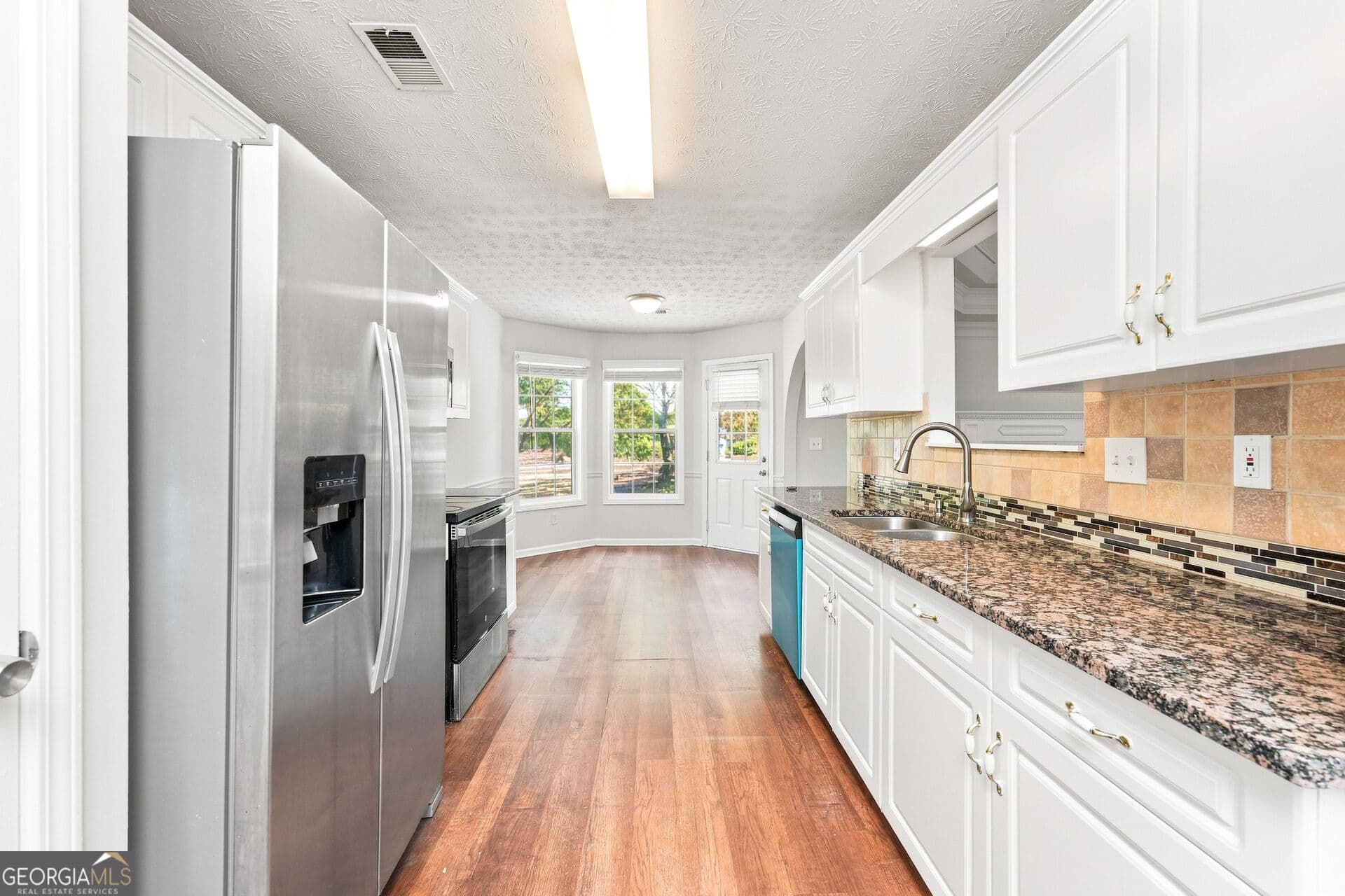 5 bedroom, 3 bathroom, 3,545 sq ft single family residence for sale at 4304 Talmadge Trace, Snellville, GA 30039 — photo 6