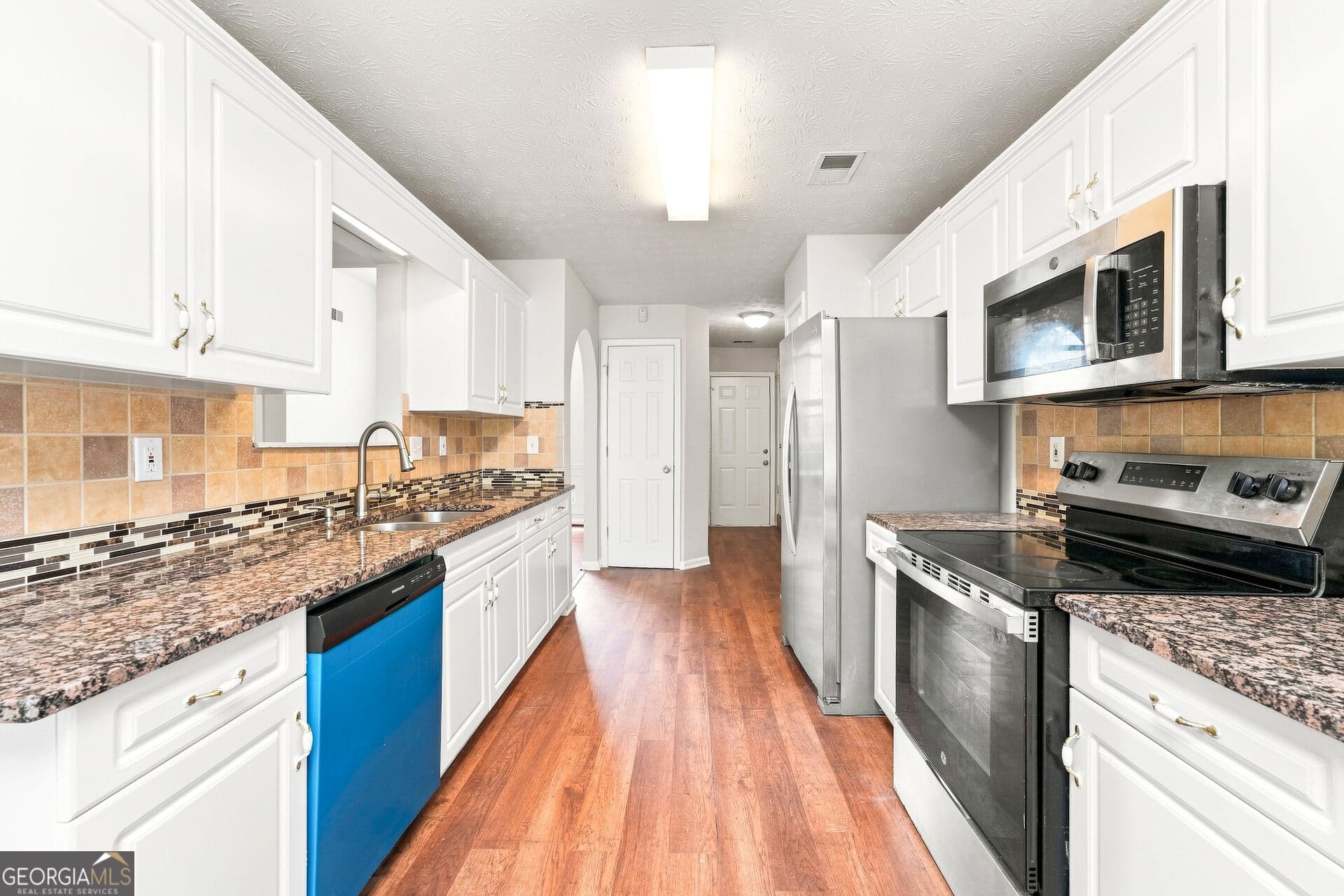 5 bedroom, 3 bathroom, 3,545 sq ft single family residence for sale at 4304 Talmadge Trace, Snellville, GA 30039 — photo 5