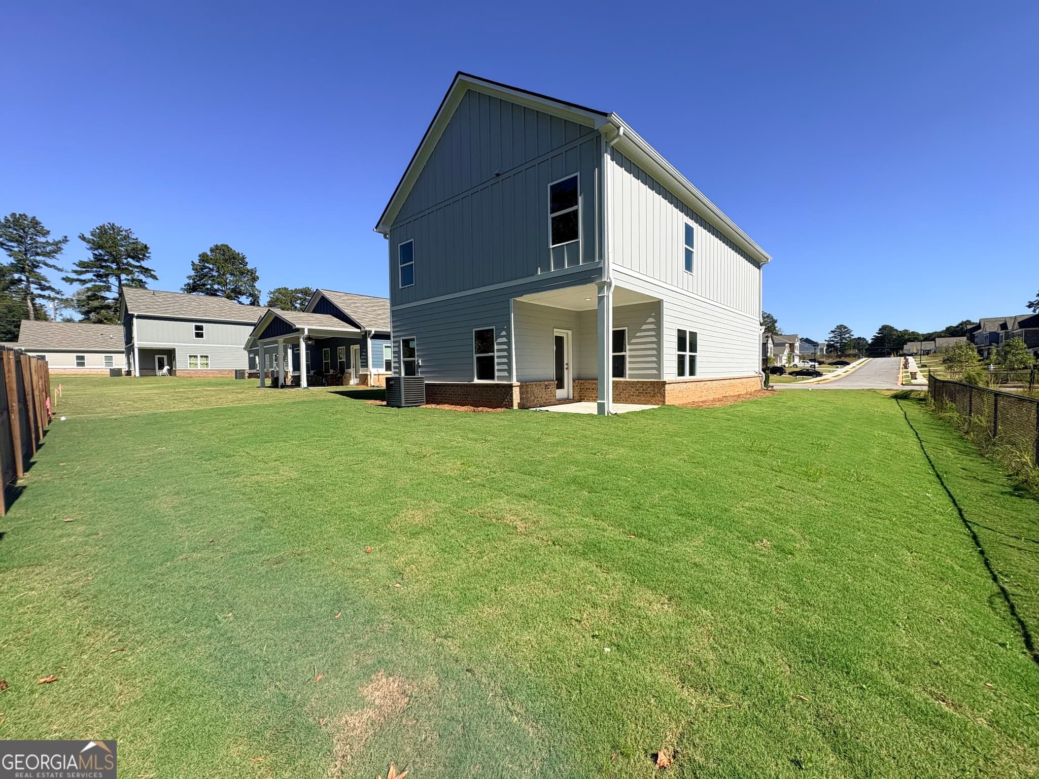 4 bedroom, 2.5 bathroom, 1,933 sq ft single family residence for sale at 1409 Trellis Court LOT 12, Hampton, GA 30228 — photo 2