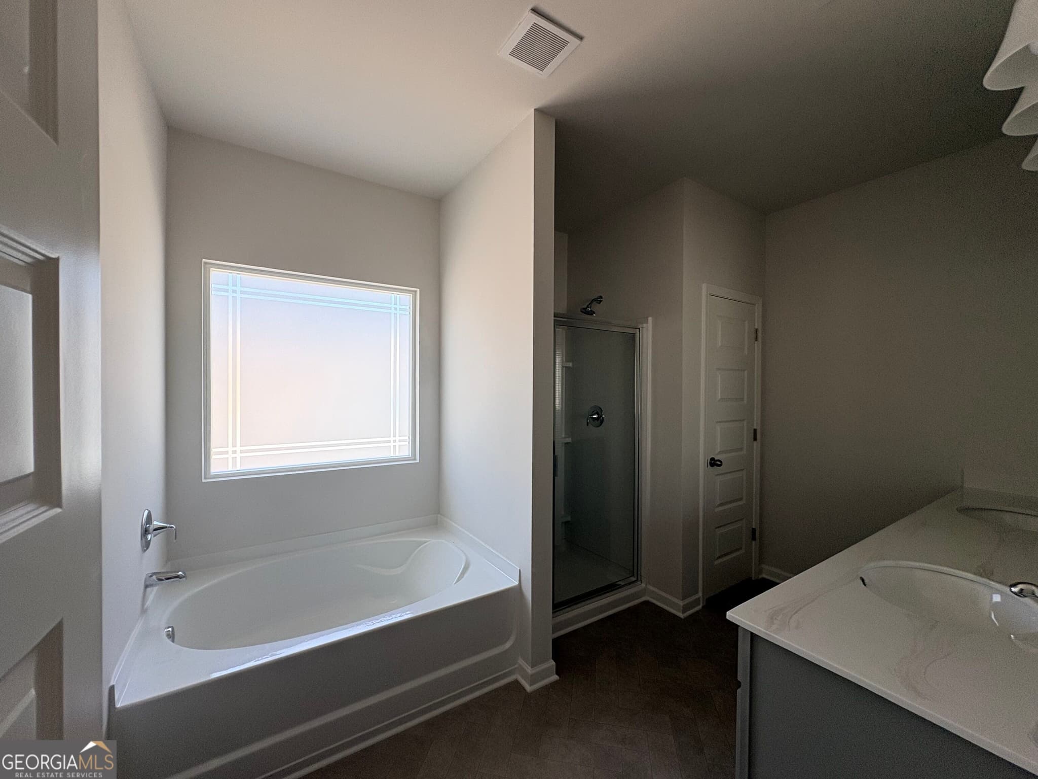4 bedroom, 2.5 bathroom, 1,933 sq ft single family residence for sale at 1409 Trellis Court LOT 12, Hampton, GA 30228 — photo 6
