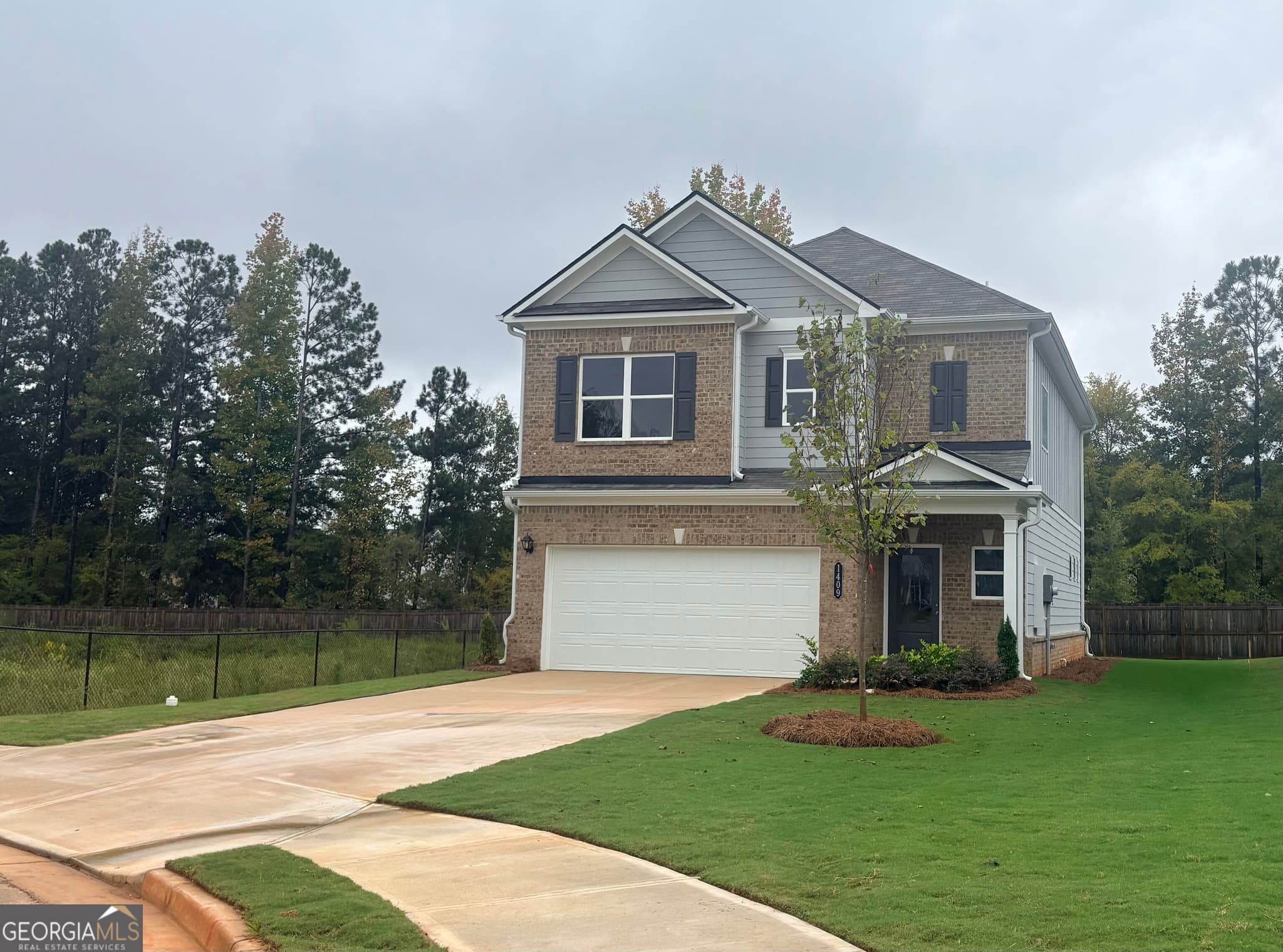 4 bedroom, 2.5 bathroom, 1,933 sq ft single family residence for sale at 1409 Trellis Court LOT 12, Hampton, GA 30228