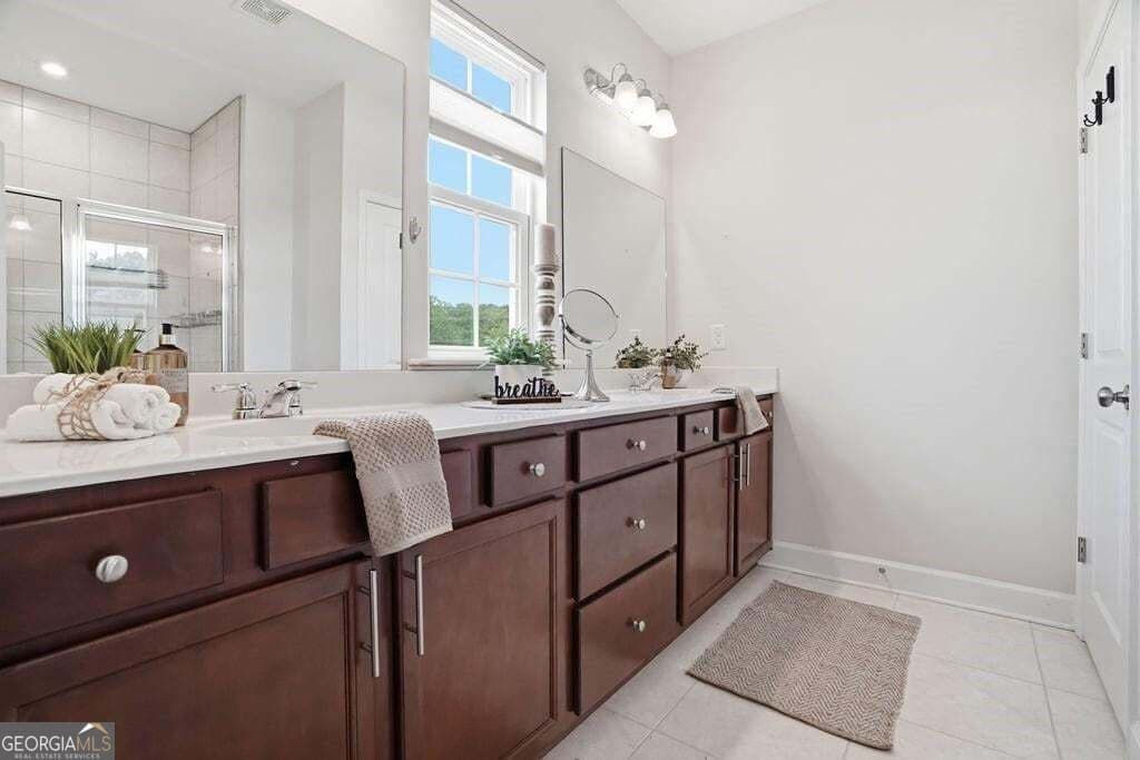 3 bedroom, 2.5 bathroom, 2,349 sq ft townhouse for sale at 1049 Caruso Drive, Buford, GA 30518 — photo 7