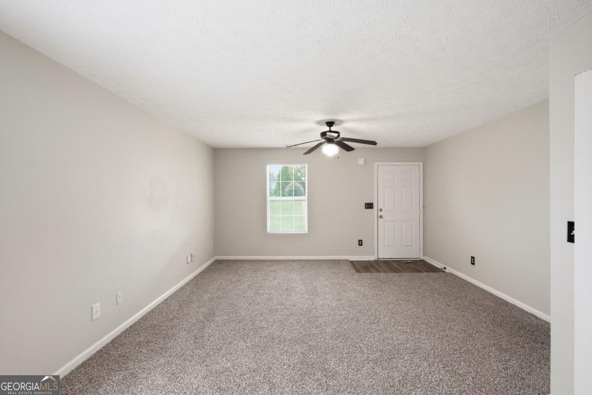 3 bedroom, 2 bathroom, 1,299 sq ft single family residence for sale at 923 Carlton Pointe Terrace, Palmetto, GA 30268 — photo 2