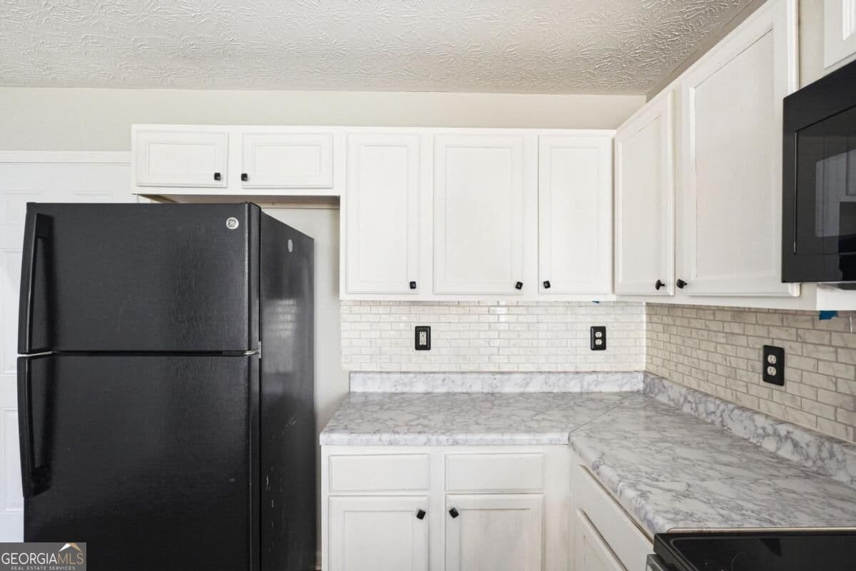 3 bedroom, 2 bathroom, 1,299 sq ft single family residence for sale at 923 Carlton Pointe Terrace, Palmetto, GA 30268 — photo 7