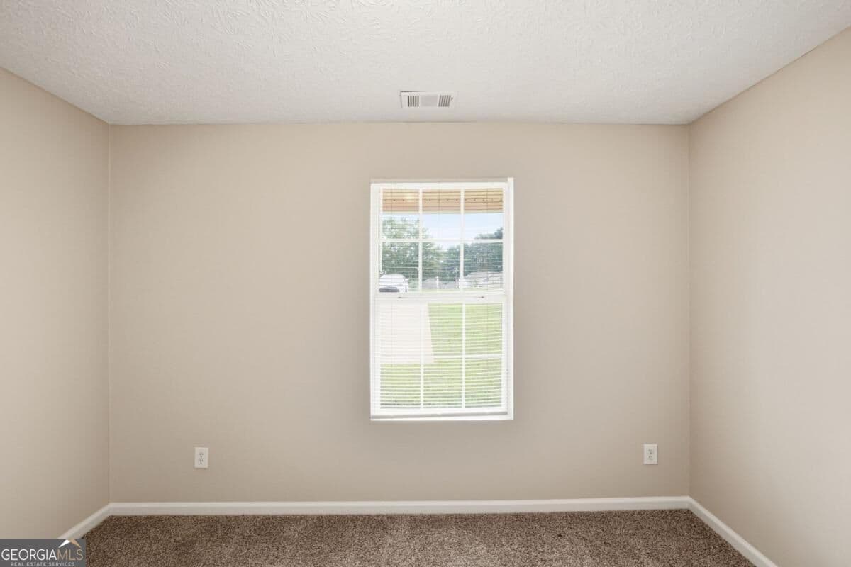 3 bedroom, 2 bathroom, 1,299 sq ft single family residence for sale at 923 Carlton Pointe Terrace, Palmetto, GA 30268 — photo 9