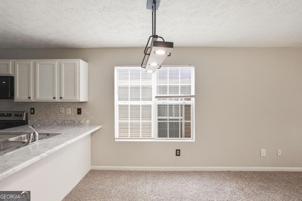 3 bedroom, 2 bathroom, 1,299 sq ft single family residence for sale at 923 Carlton Pointe Terrace, Palmetto, GA 30268 — photo 4