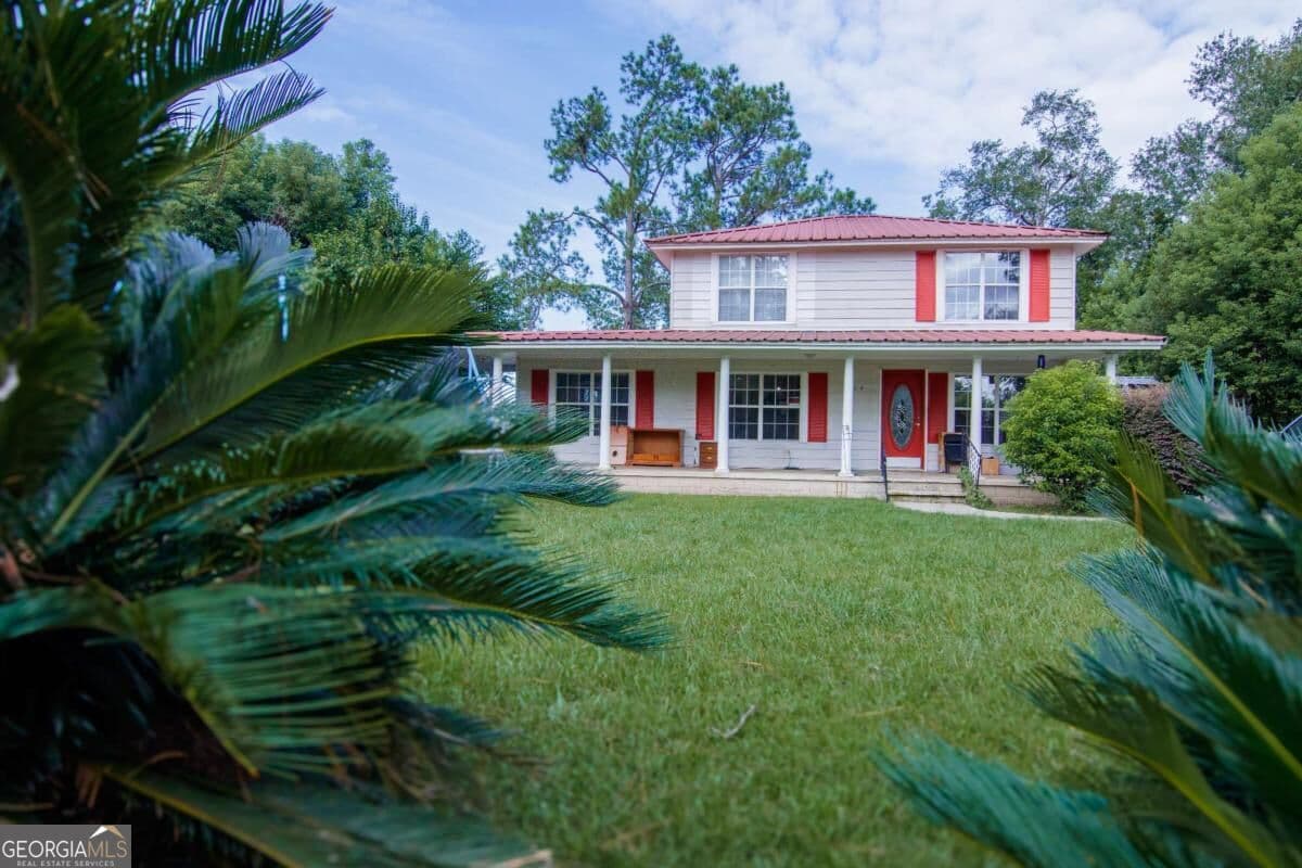 3 bedroom, 2 bathroom single family residence for sale at 604 Jackson Street, Nashville, GA 31639 — photo 2