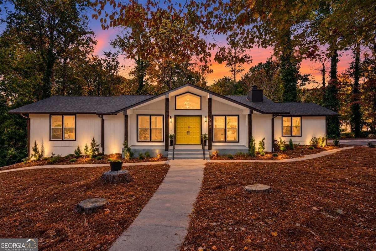 4 bedroom, 3.5 bathroom, 3,146 sq ft single family residence for sale at 5303 Raintree Circle, Oakwood, GA 30566 — photo 2