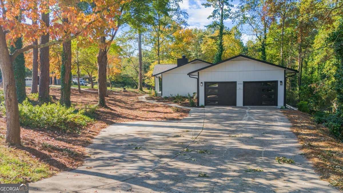 4 bedroom, 3.5 bathroom, 3,146 sq ft single family residence for sale at 5303 Raintree Circle, Oakwood, GA 30566 — photo 6