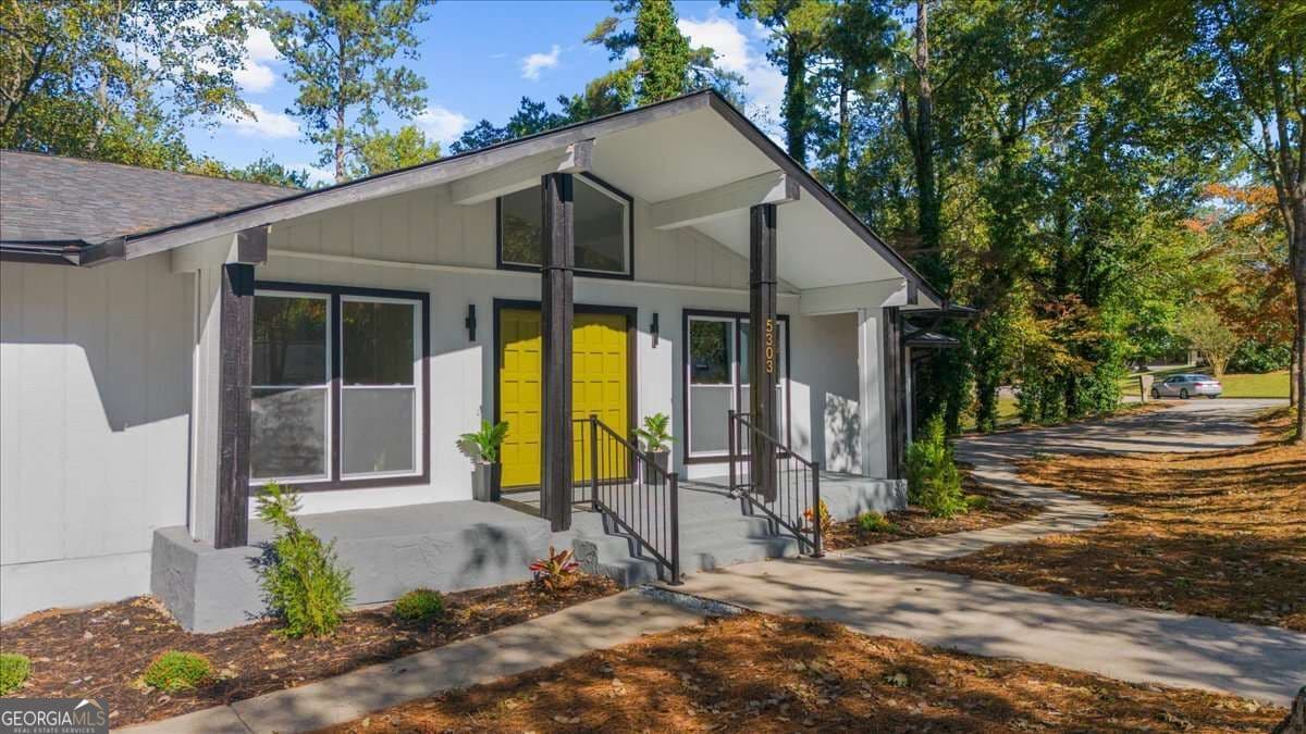 4 bedroom, 3.5 bathroom, 3,146 sq ft single family residence for sale at 5303 Raintree Circle, Oakwood, GA 30566 — photo 3