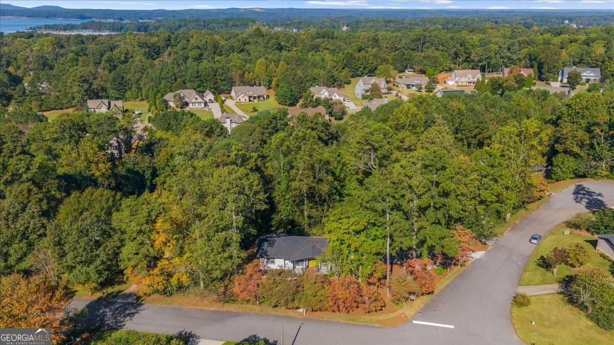 4 bedroom, 3.5 bathroom, 3,146 sq ft single family residence for sale at 5303 Raintree Circle, Oakwood, GA 30566 — photo 9