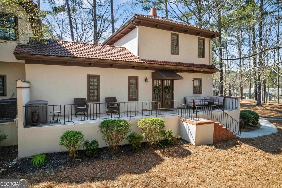 3 bedroom, 2 bathroom, 1,814 sq ft townhouse for sale at 1432 Club Drive, Greensboro, GA 30642 — photo 1 of 50