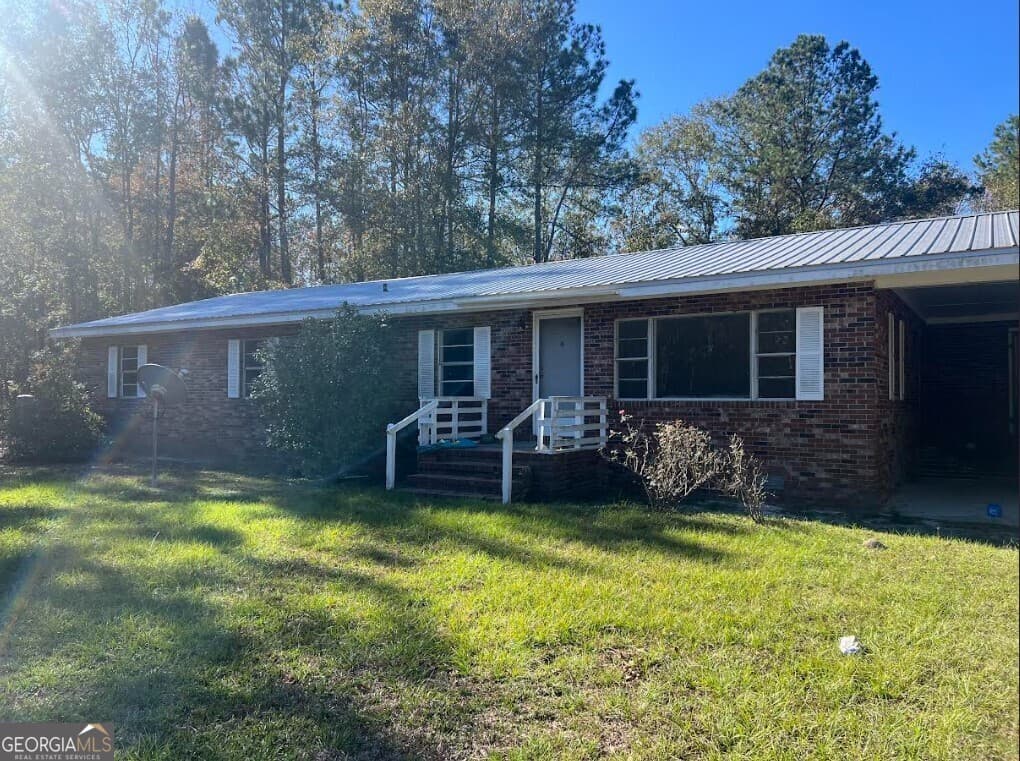 4 bedroom, 2 bathroom, 2,079 sq ft single family residence sold at 2169 Duck Pond Road, Sylvania, GA 30467