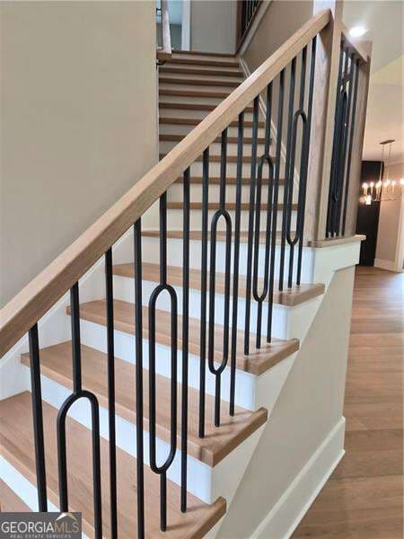 5 bedroom, 4.5 bathroom single family residence for sale at 5310 West Parc Place, Cumming, GA 30040 — photo 4