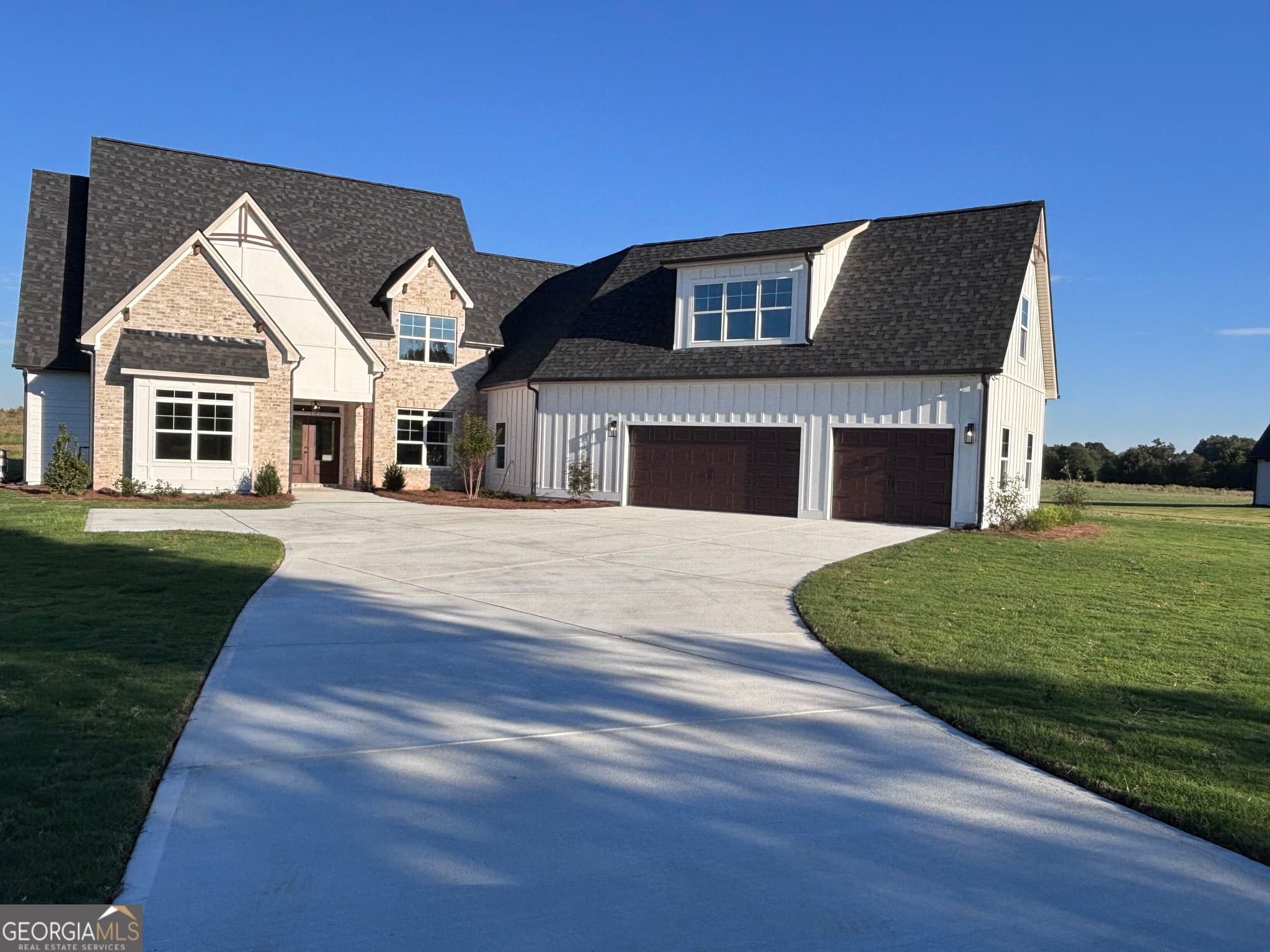 5 bedroom, 5 bathroom, 4,161 sq ft single family residence for sale at 678 Inman Road 1, Fayetteville, GA 30215 — photo 1 of 57