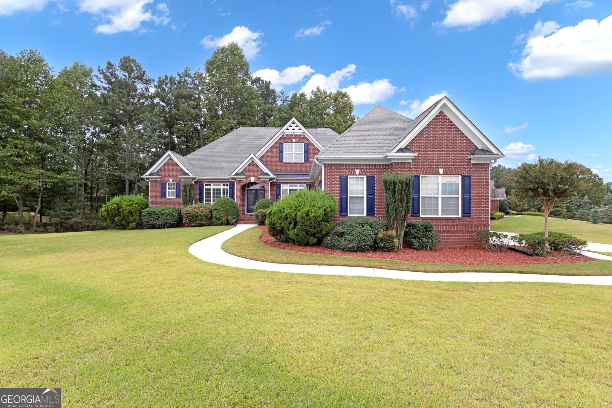 5 bedroom, 4.5 bathroom, 5,461 sq ft single family residence for sale at 5655 Toccoa Drive, Douglasville, GA 30135 — photo 2