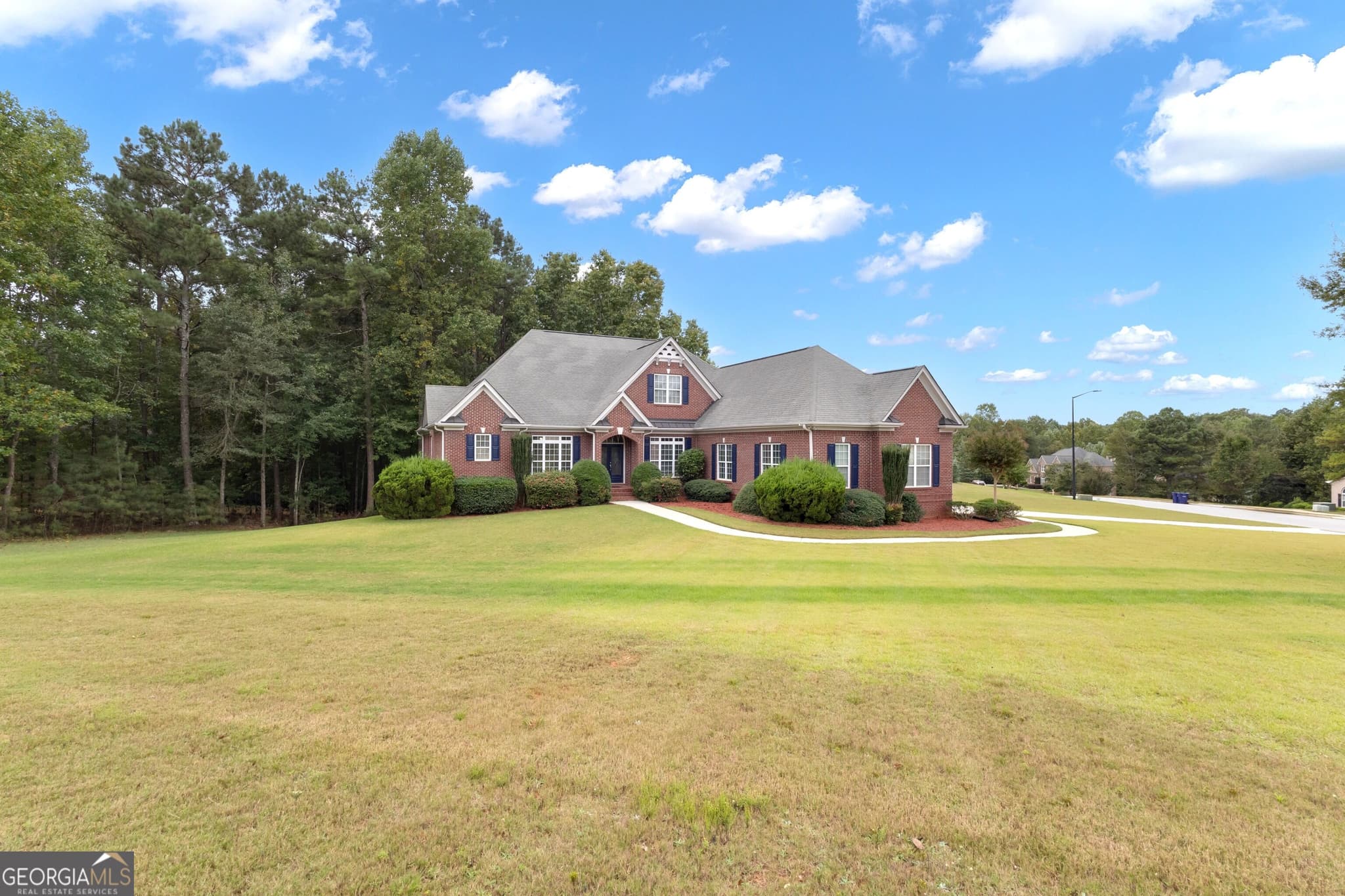 5 bedroom, 4.5 bathroom, 5,461 sq ft single family residence for sale at 5655 Toccoa Drive, Douglasville, GA 30135 — photo 3
