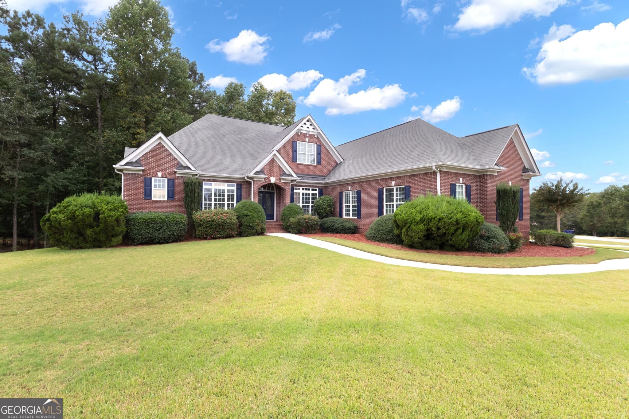 5 bedroom, 4.5 bathroom, 5,461 sq ft single family residence for sale at 5655 Toccoa Drive, Douglasville, GA 30135 — photo 1 of 84