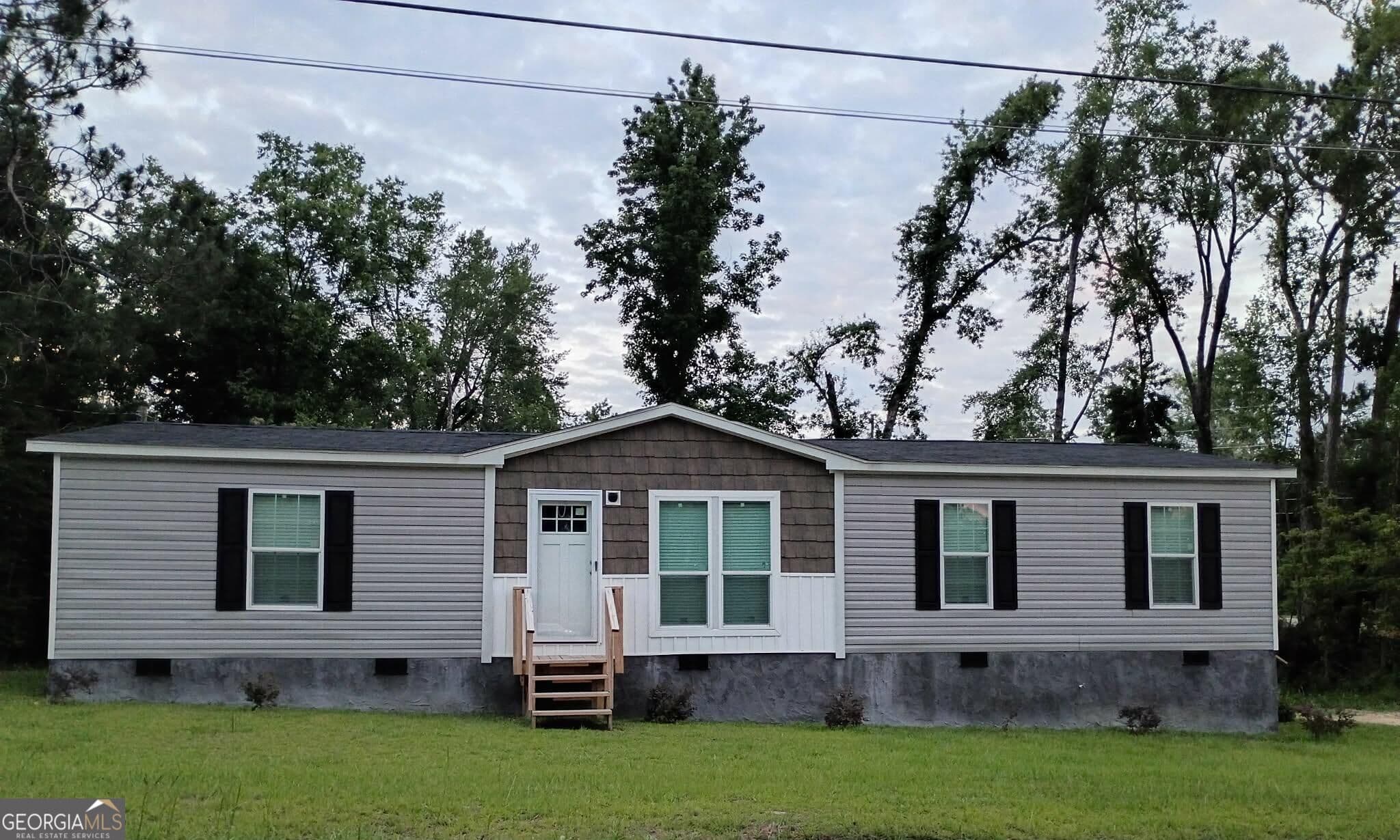 3 bedroom, 2 bathroom, 1,493 sq ft manufactured home,single family residence for sale at 138 Canary Circle, Soperton, GA 30457