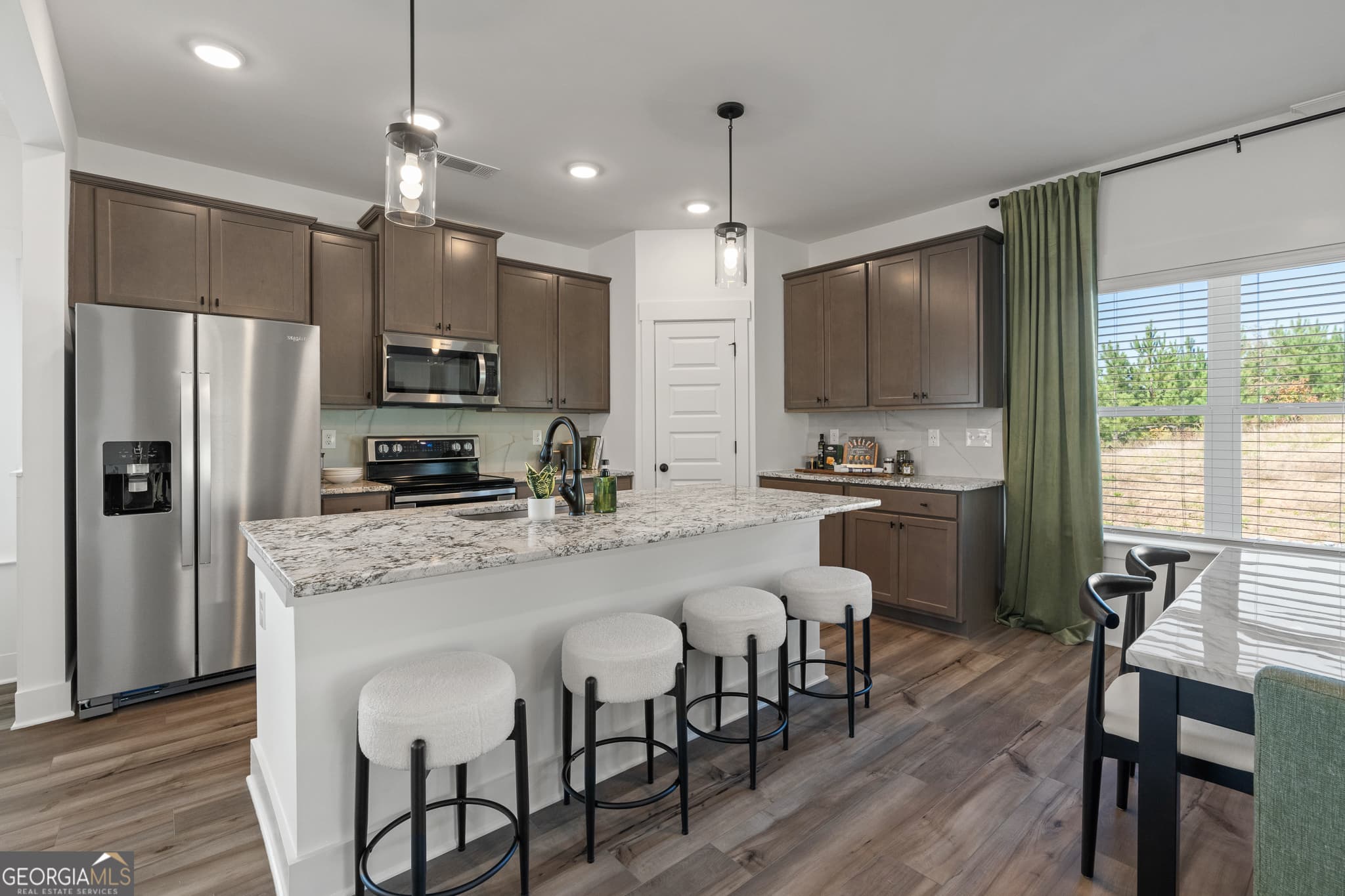 5 bedroom, 4 bathroom, 2,874 sq ft single family residence for sale at 2111 Breamore Drive, Covington, GA 30016 — photo 3