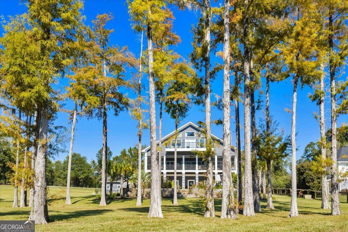 5 bedroom, 4 bathroom, 5,970 sq ft single family residence for sale at 119 N Cedar Creek Road, Cordele, GA 31015 — photo 7