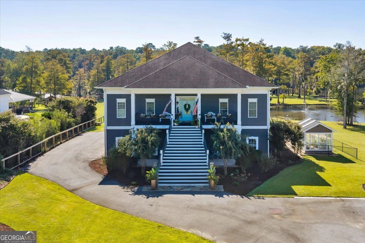5 bedroom, 4 bathroom, 5,970 sq ft single family residence for sale at 119 N Cedar Creek Road, Cordele, GA 31015 — photo 5