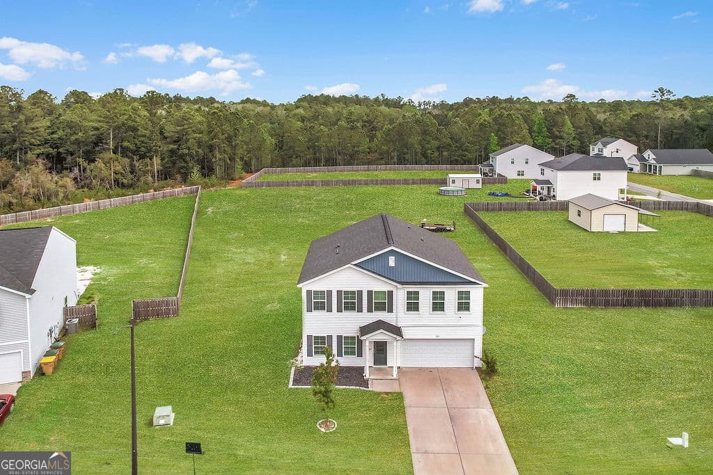5 bedroom, 2.5 bathroom, 2,328 sq ft single family residence for sale at 231 Caroline Way, Guyton, GA 31312 — photo 2