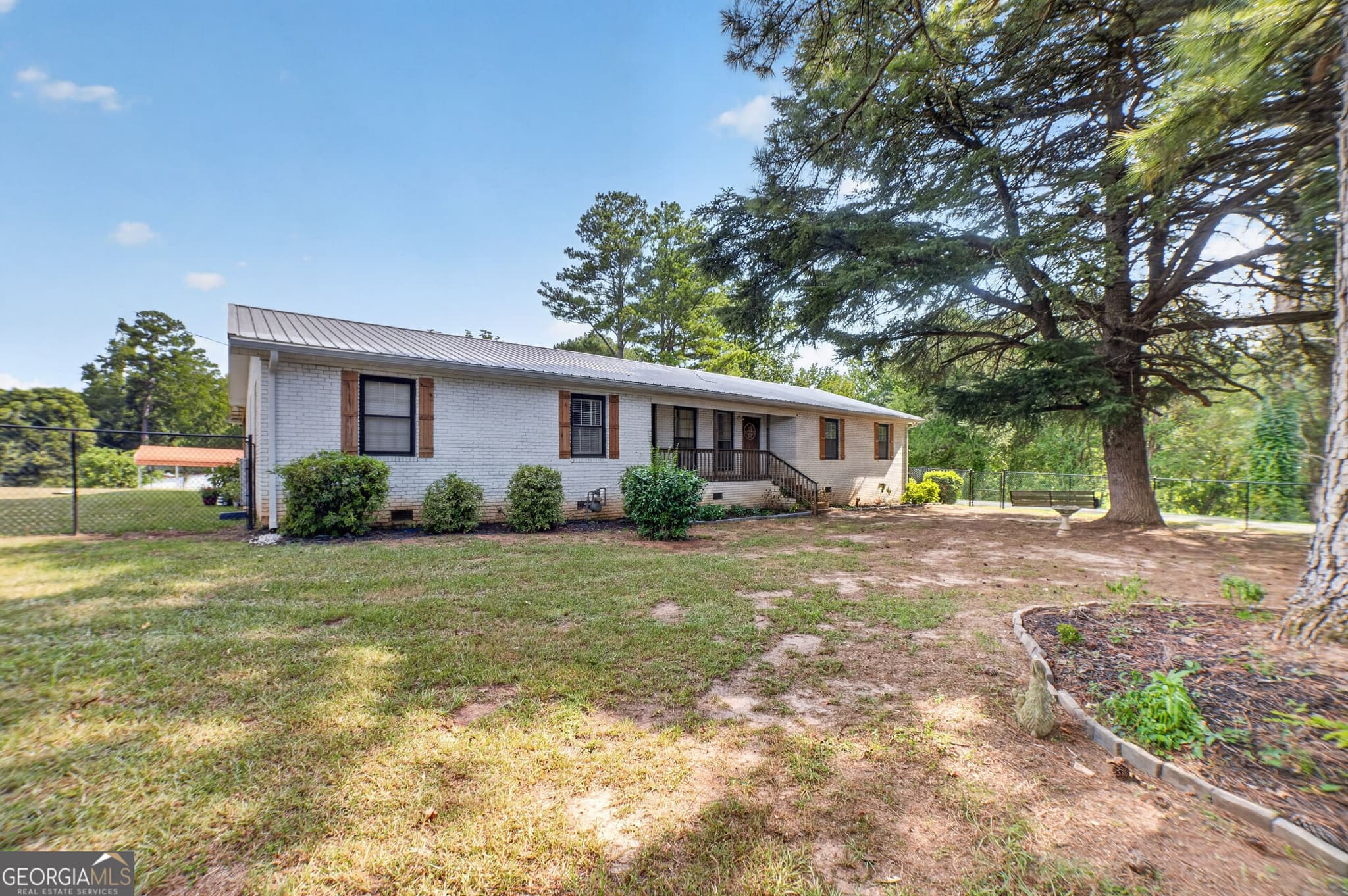 4 bedroom, 2 bathroom, 2,194 sq ft single family residence for sale at 6293 Thomaston Road, Macon, GA 31220 — photo 2