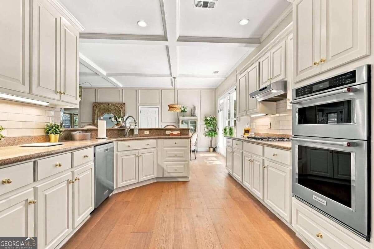4 bedroom, 4.5 bathroom, 3,090 sq ft single family residence for sale at 1426 Hedgewood Lane, Kennesaw, GA 30152 — photo 9