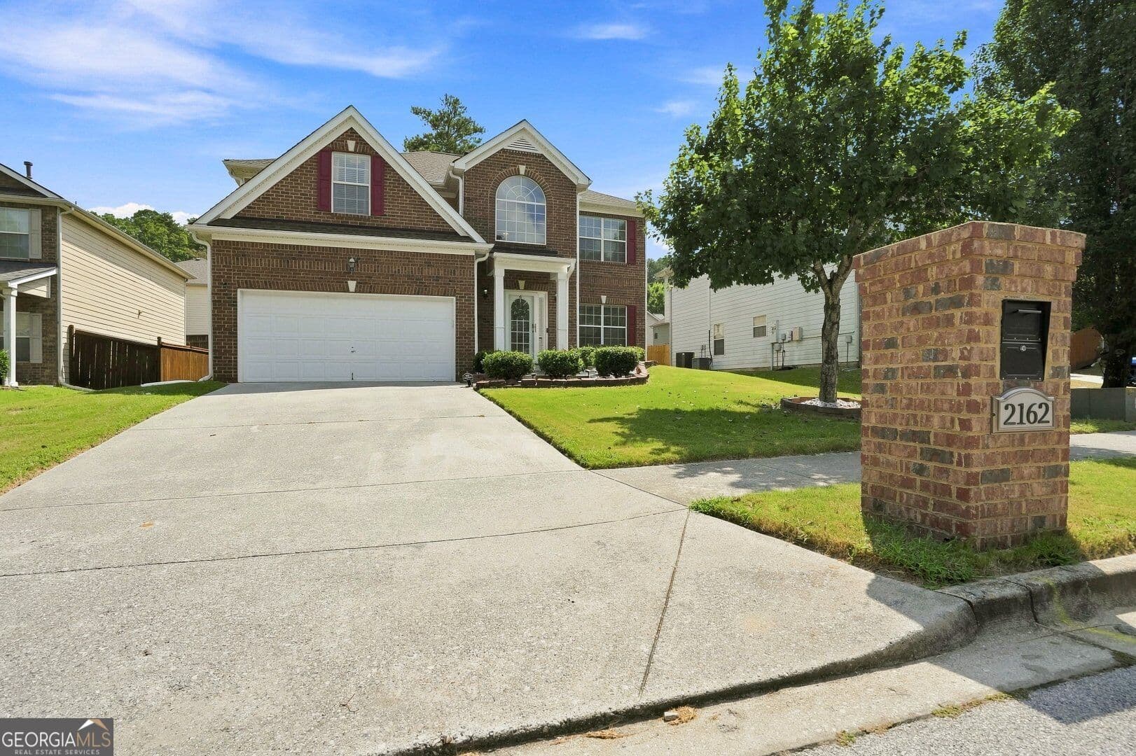 4 bedroom, 2.5 bathroom, 2,770 sq ft single family residence for sale at 2162 Poplar Falls Avenue, Lithonia, GA 30058 — photo 2