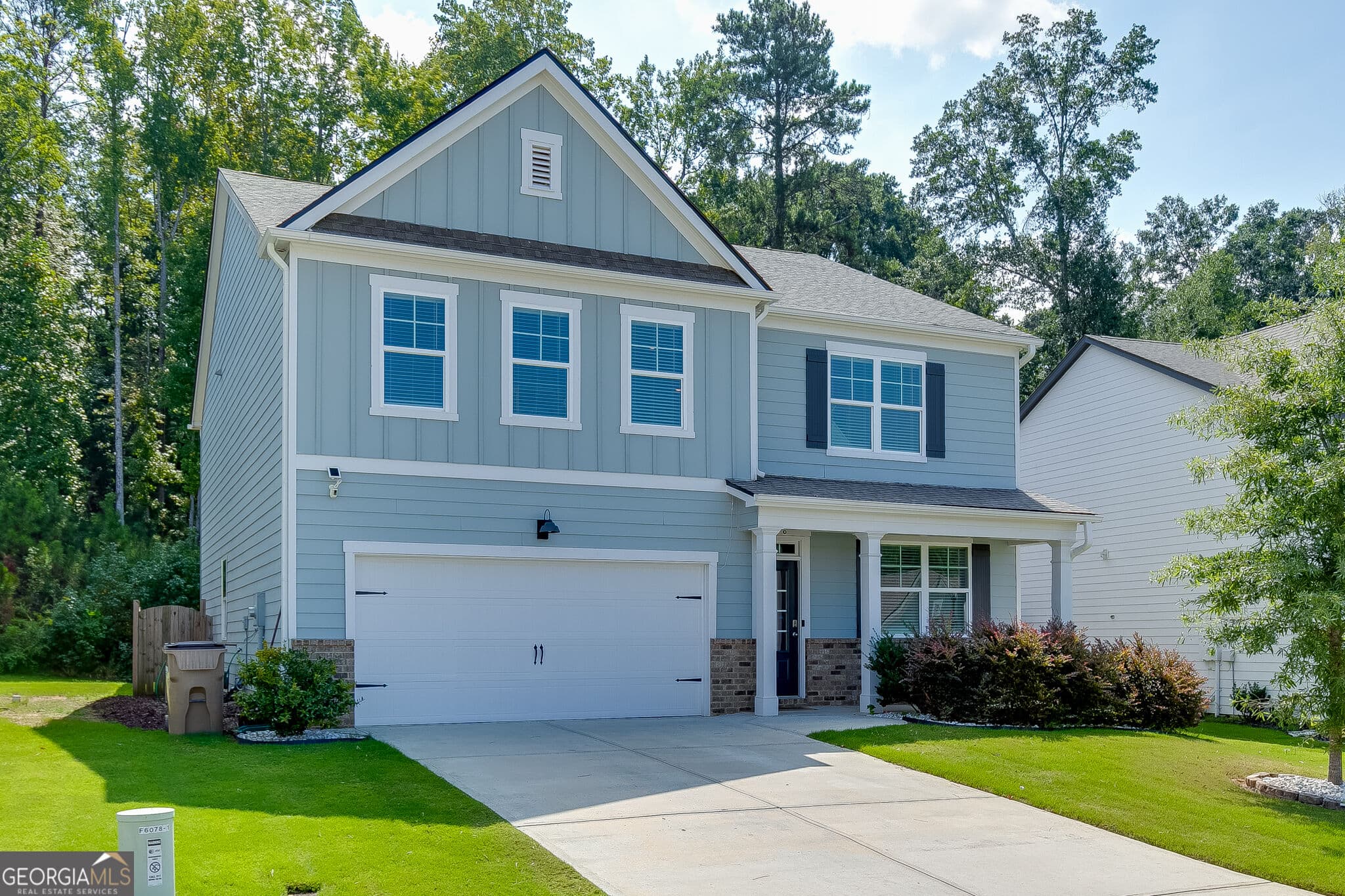 5 bedroom, 3 bathroom, 2,788 sq ft single family residence for sale at 6078 Trumpet Flower Avenue, Flowery Branch, GA 30542 — photo 2