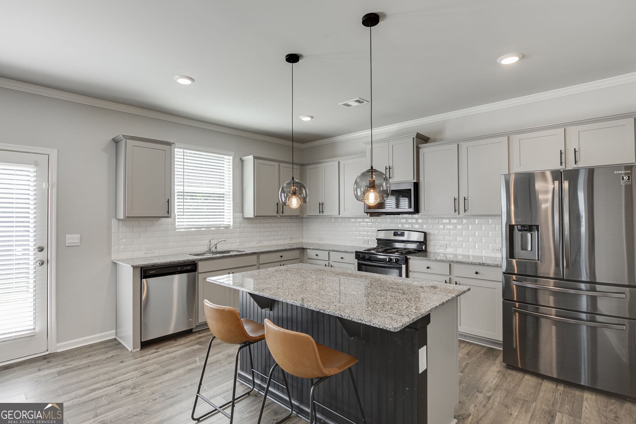 5 bedroom, 3 bathroom, 2,788 sq ft single family residence for sale at 6078 Trumpet Flower Avenue, Flowery Branch, GA 30542 — photo 6