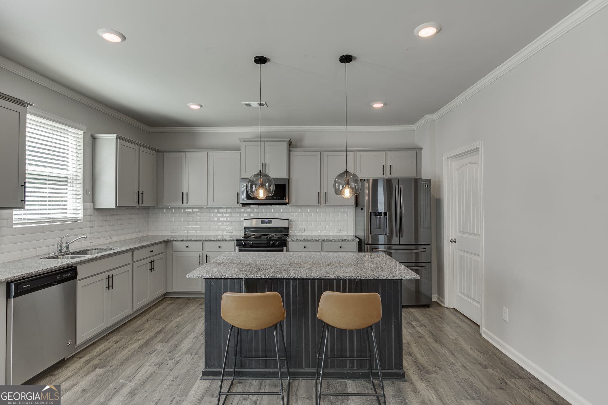 5 bedroom, 3 bathroom, 2,788 sq ft single family residence for sale at 6078 Trumpet Flower Avenue, Flowery Branch, GA 30542 — photo 7