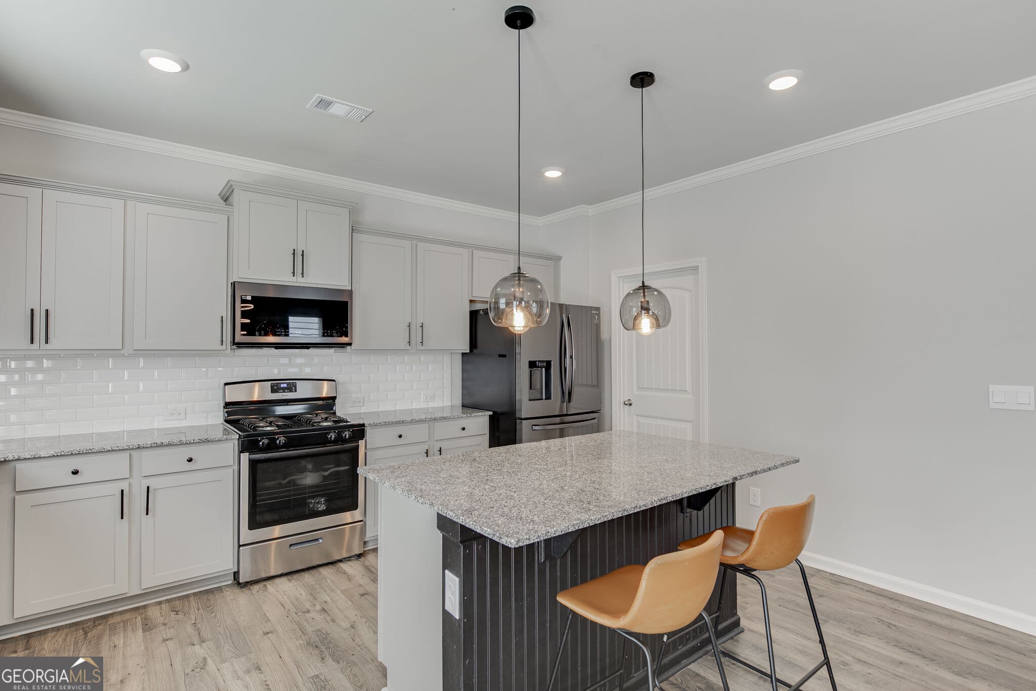 5 bedroom, 3 bathroom, 2,788 sq ft single family residence for sale at 6078 Trumpet Flower Avenue, Flowery Branch, GA 30542 — photo 8