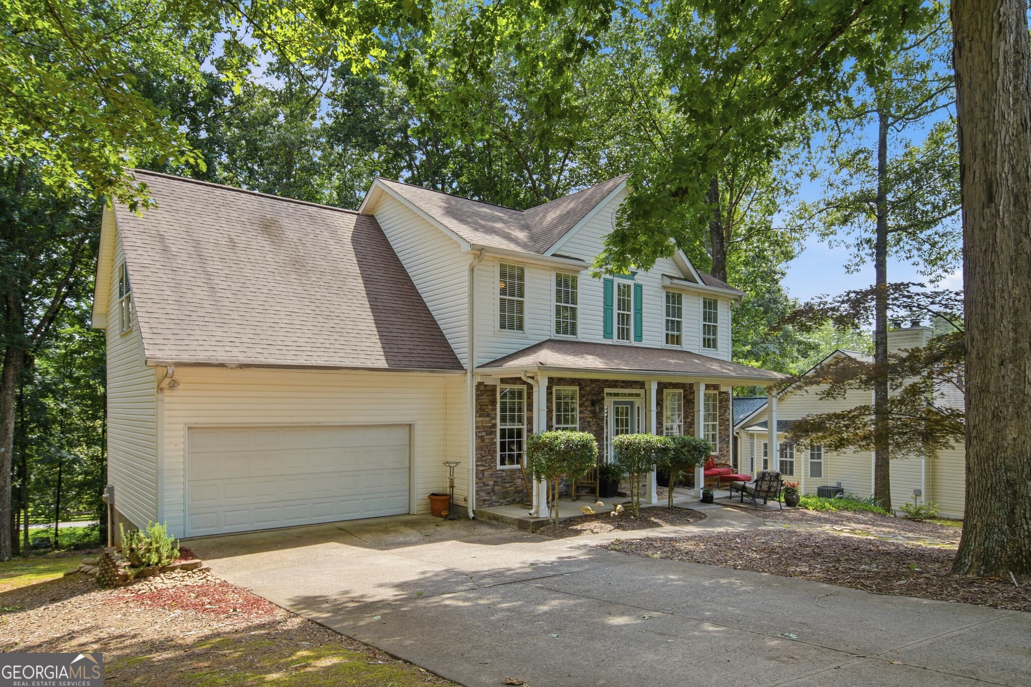 4 bedroom, 3 bathroom, 2,140 sq ft single family residence for sale at 4050 Shelby Lane, Cumming, GA 30041 — photo 4