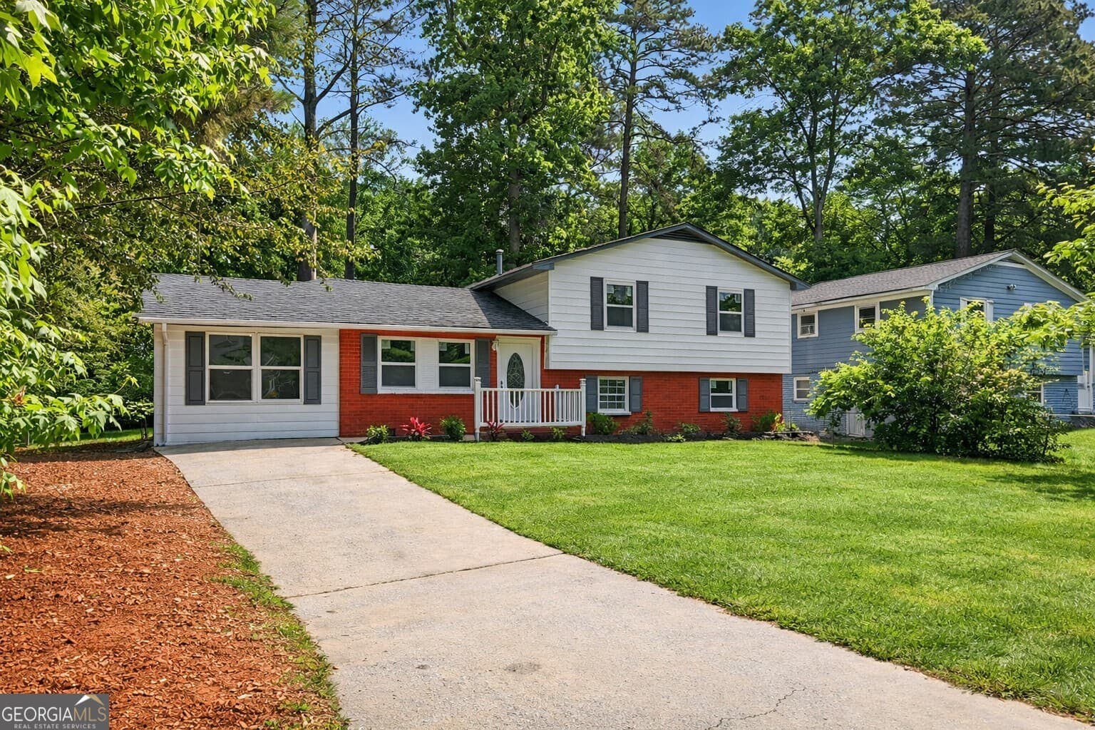 6 bedroom, 2.5 bathroom single family residence for sale at 7348 Mockingbird Trail, Riverdale, GA 30274 — photo 2