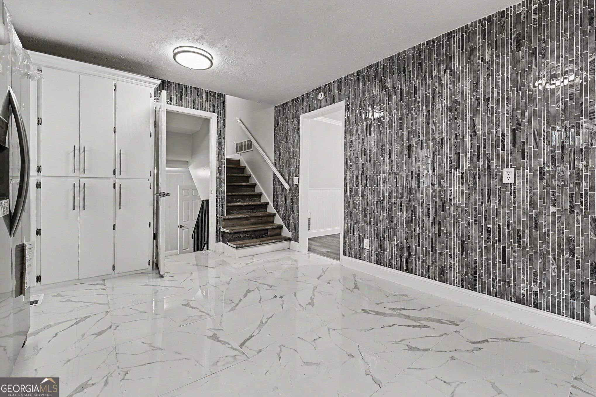 6 bedroom, 2.5 bathroom single family residence for sale at 7348 Mockingbird Trail, Riverdale, GA 30274 — photo 10
