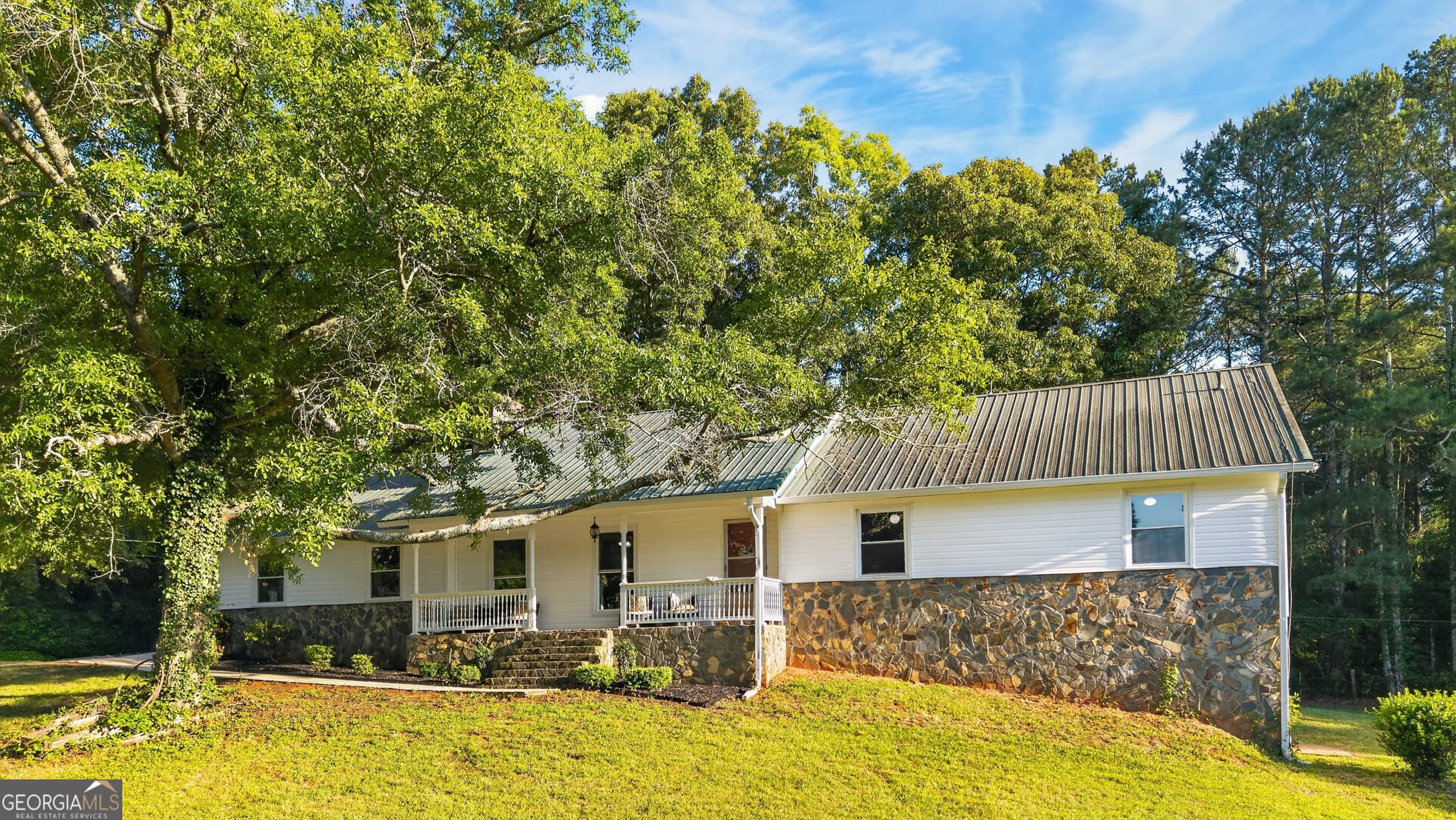 4 bedroom, 3 bathroom, 3,645 sq ft single family residence for sale at 662 Highway 18, Barnesville, GA 30204 — photo 2
