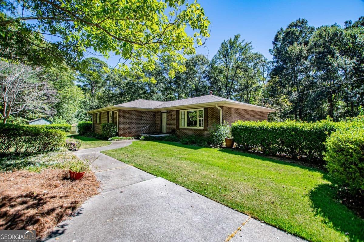 4 bedroom, 3 bathroom, 1,612 sq ft single family residence for sale at 59 Hutcheson Ferry Road, Whitesburg, GA 30185 — photo 5