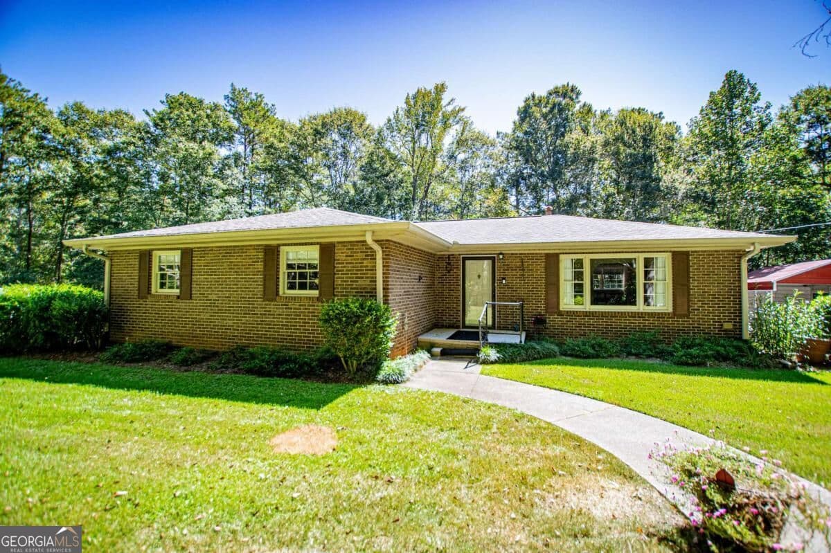 4 bedroom, 3 bathroom, 1,612 sq ft single family residence for sale at 59 Hutcheson Ferry Road, Whitesburg, GA 30185 — photo 4