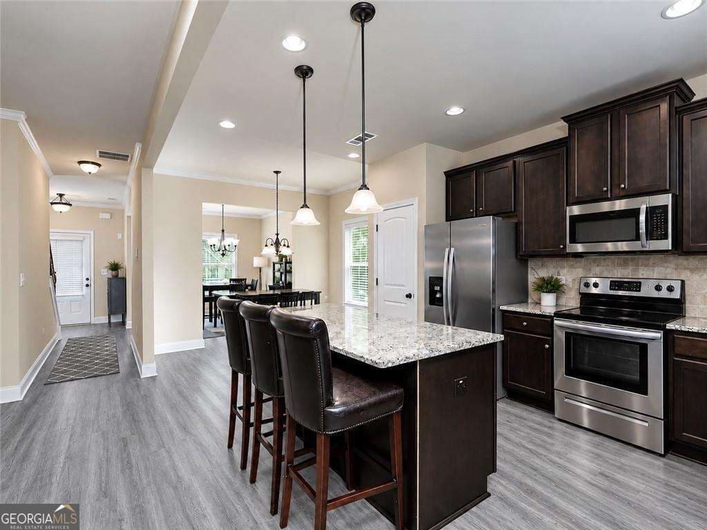 5 bedroom, 3 bathroom, 2,716 sq ft single family residence for sale at 2009 River Falls Drive, Griffin, GA 30223 — photo 5