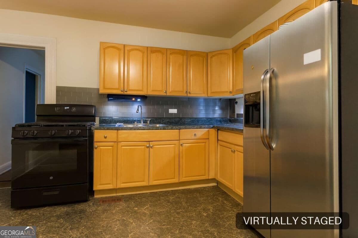 3 bedroom, 1 bathroom, 1,568 sq ft single family residence for sale at 2886 Burden Street, Atlanta, GA 30318 — photo 4