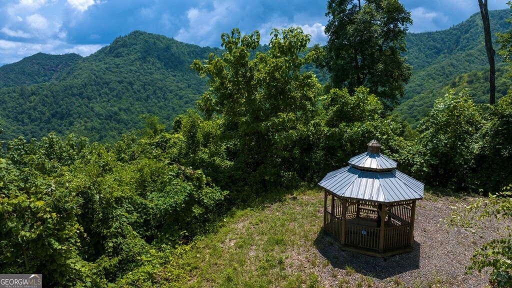 1 bedroom, 1 bathroom, 2,240 sq ft cabin,single family residence for sale at 235 Rios Drive, Bryson City, NC 28713 — photo 2