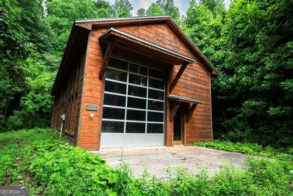 1 bedroom, 1 bathroom, 2,240 sq ft cabin,single family residence for sale at 235 Rios Drive, Bryson City, NC 28713 — photo 1 of 29