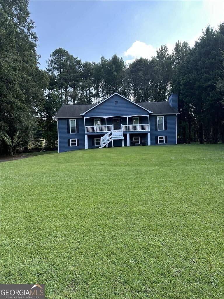 4 bedroom, 2 bathroom, 2,062 sq ft single family residence for sale at 106 Courtland Circle, Powder Springs, GA 30127 — photo 2