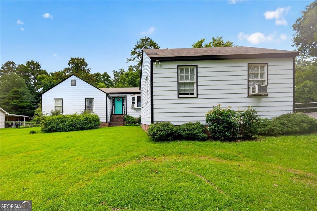 4 bedroom, 1.5 bathroom, 1,976 sq ft single family residence for sale at 6603 Dana Drive, Macon, GA 31220 — photo 2